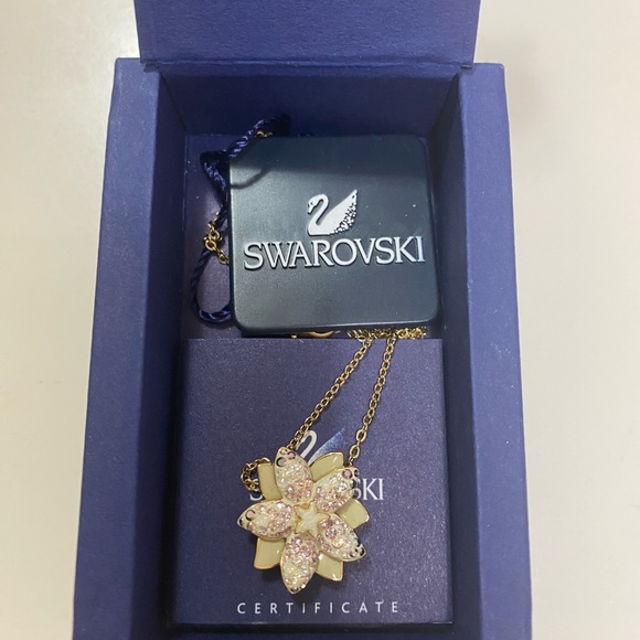 Swarovski Jewelry - Swarovski Gold-Tone Necklace with Pink Crystal Flower Pendant